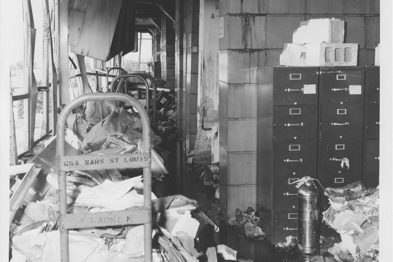 Fire-damaged interior with standing water from firefighting